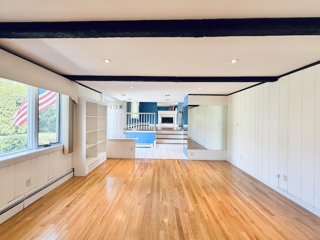 12 Rolling Ln, Norwalk, CT 06851 - unfurnished living room featuring baseboard heating, light wood-type flooring, beam ceiling, and a fireplace