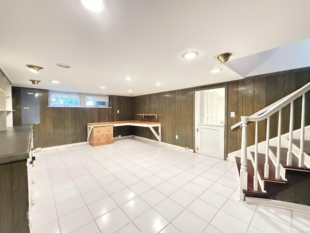 12 Rolling Ln, Norwalk, CT 06851 - below grade area featuring wooden walls, stairs, and recessed lighting
