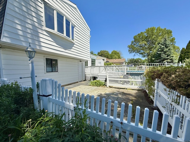 12 Rolling Ln, Norwalk, CT 06851 - fenced yard with a patio area