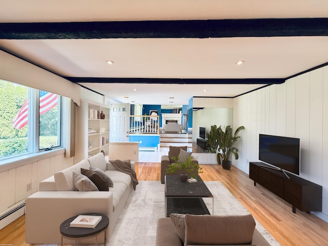 12 Rolling Ln, Norwalk, CT 06851 - living room featuring light wood-style flooring, a baseboard heating unit, beamed ceiling, and wooden walls