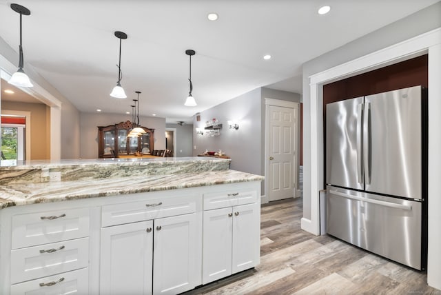 254 Haley Rd, Groton, CT 06355 - kitchen featuring freestanding refrigerator, light wood finished floors, white cabinetry, recessed lighting, and light stone countertops
