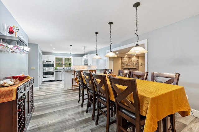254 Haley Rd, Groton, CT 06355 - dining area with light wood-style flooring and recessed lighting