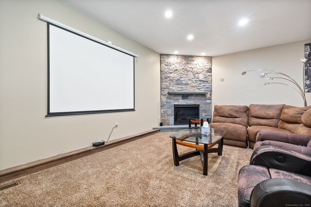 254 Haley Rd, Groton, CT 06355 - carpeted cinema featuring recessed lighting and a stone fireplace