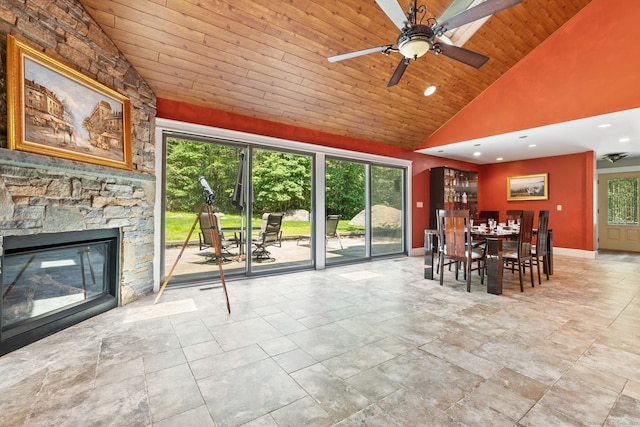 254 Haley Rd, Groton, CT 06355 - dining room with wood ceiling, high vaulted ceiling, a stone fireplace, ceiling fan, and recessed lighting