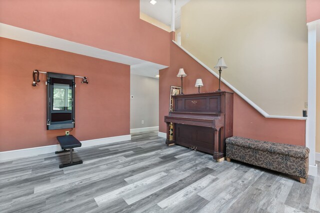 254 Haley Rd, Groton, CT 06355 - interior space featuring wood finished floors and a towering ceiling