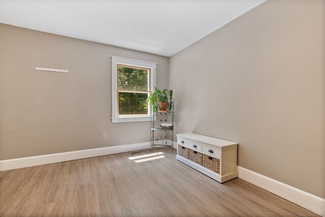 254 Haley Rd, Groton, CT 06355 - empty room with wood finished floors