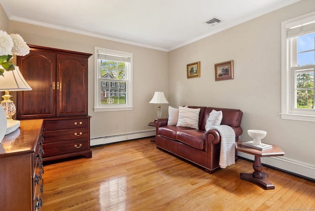 129 Brookmere Dr, Fairfield, CT 06824 - living area featuring a baseboard heating unit, light wood finished floors, crown molding, and baseboards