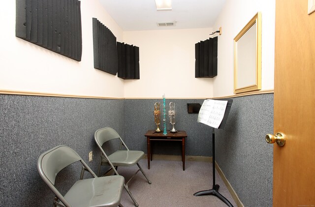 171 Main St, East Lyme, CT 06357 - living area with wainscoting and carpet floors