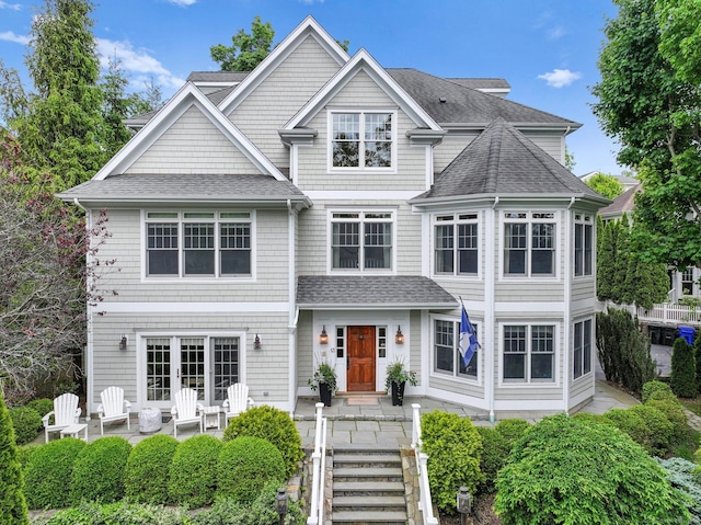 13 Witch Ln, Norwalk, CT 06853 - view of front of house with roof with shingles and a patio area