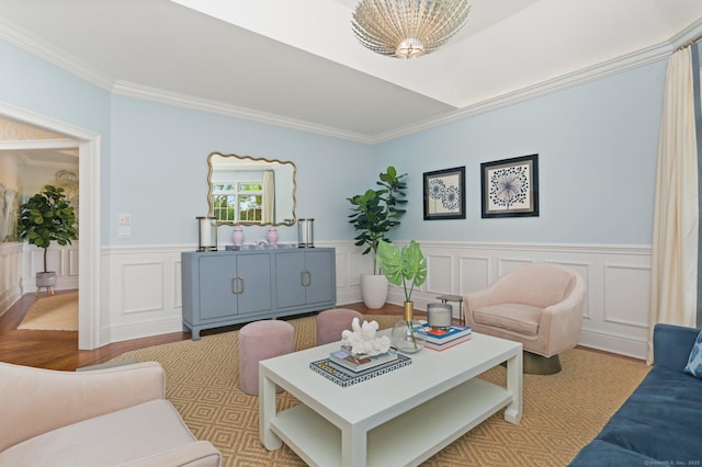 13 Witch Ln, Norwalk, CT 06853 - living room with crown molding, light wood finished floors, a decorative wall, and a wainscoted wall