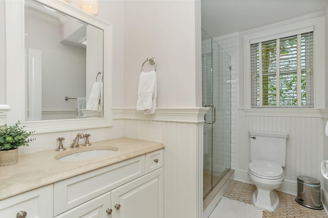 13 Witch Ln, Norwalk, CT 06853 - bathroom featuring vanity, toilet, a shower stall, and tile patterned flooring