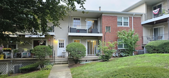 50 Greenhouse Rd Unit 41C, Bridgeport, CT 06606 - multi unit property with a front lawn, cooling unit, and a balcony