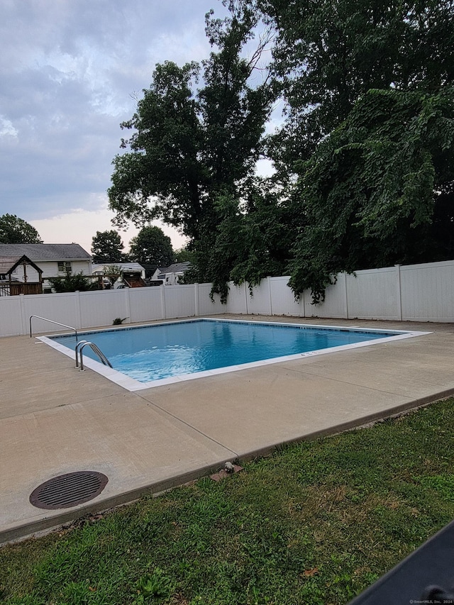 50 Greenhouse Rd Unit 41C, Bridgeport, CT 06606 - view of swimming pool featuring a patio and a fenced backyard