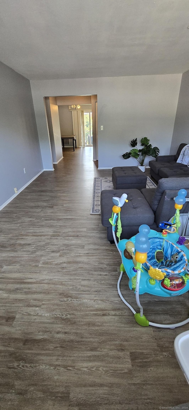 50 Greenhouse Rd Unit 41C, Bridgeport, CT 06606 - living room with baseboards and wood finished floors