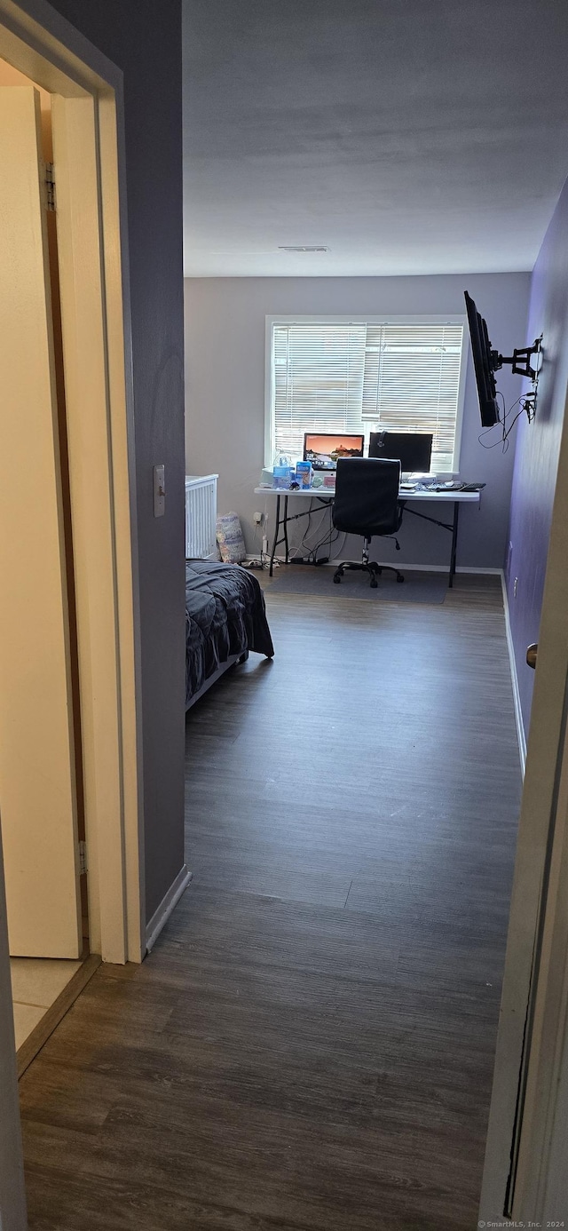 50 Greenhouse Rd Unit 41C, Bridgeport, CT 06606 - bedroom featuring wood finished floors, a desk, and baseboards