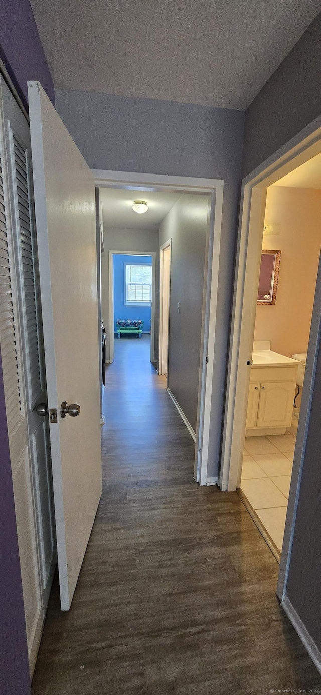 50 Greenhouse Rd Unit 41C, Bridgeport, CT 06606 - hall featuring dark wood-style floors and baseboards