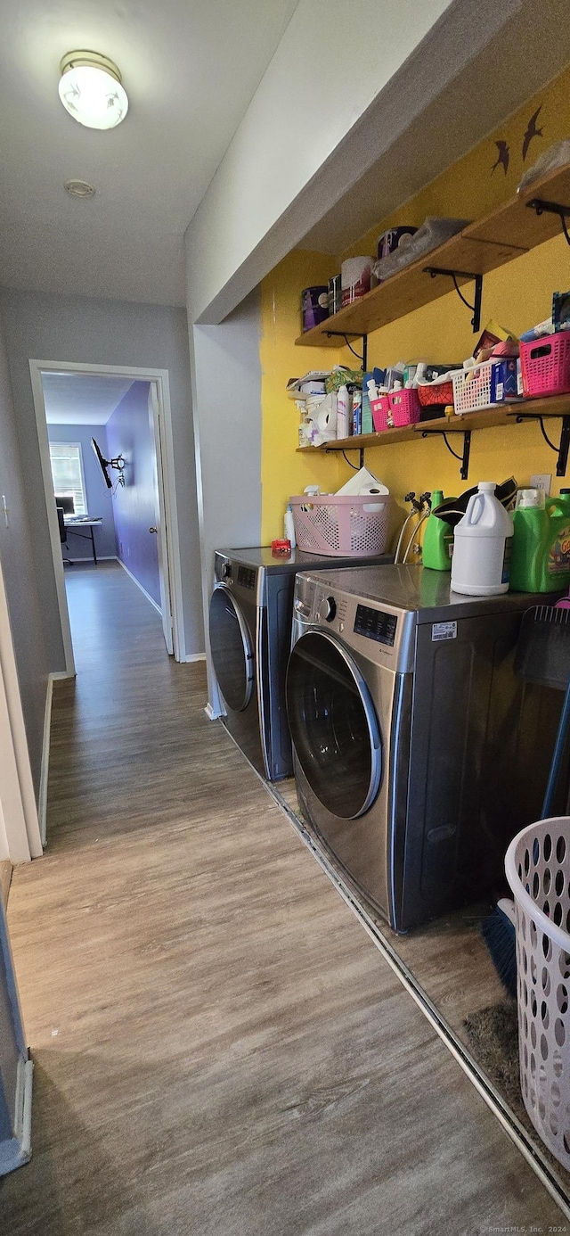50 Greenhouse Rd Unit 41C, Bridgeport, CT 06606 - laundry room with washing machine and clothes dryer, wood finished floors, and baseboards