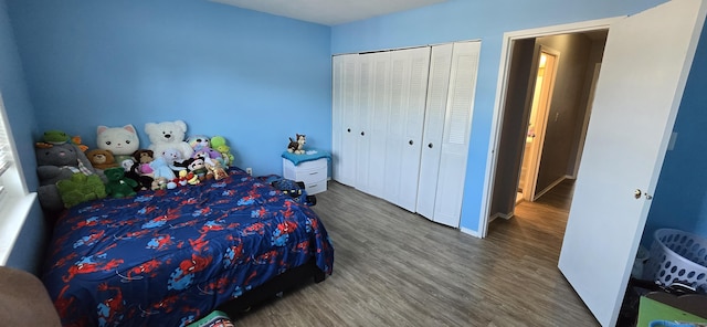 50 Greenhouse Rd Unit 41C, Bridgeport, CT 06606 - bedroom featuring wood finished floors, a closet, and baseboards