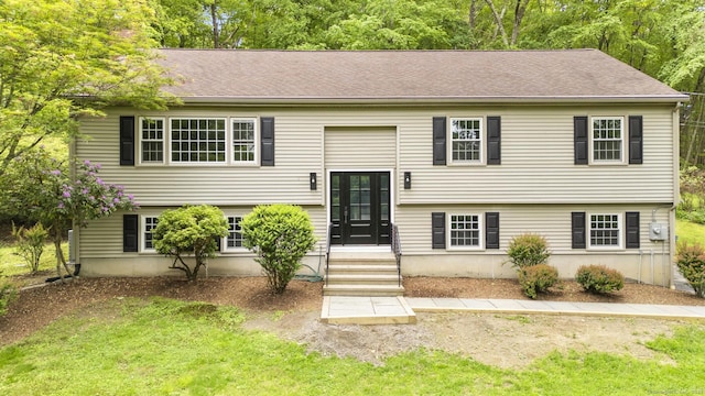 23 Aunt Pattys Ln W, Bethel, CT 06801 - bi-level home with a front yard and a shingled roof