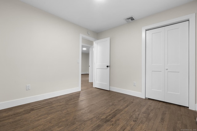 23 Aunt Pattys Ln W, Bethel, CT 06801 - unfurnished bedroom with wood finished floors, baseboards, and a closet