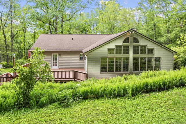 23 Aunt Pattys Ln W, Bethel, CT 06801 - rear view of house featuring a deck and roof with shingles