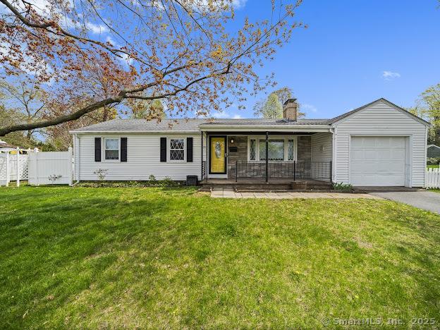 21 Poplar St, Enfield, CT 06082 - single story home with a porch, a garage, a chimney, and driveway