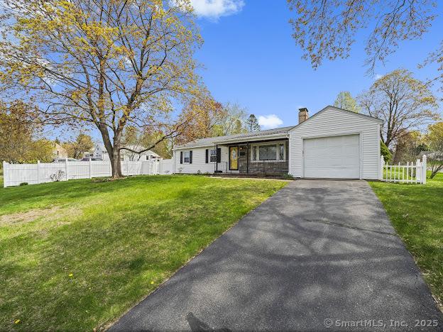 21 Poplar St, Enfield, CT 06082 - ranch-style home with a chimney, a garage, and asphalt driveway