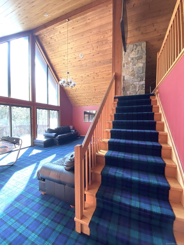 21 Holiday Point Rd, Sherman, CT 06784 - stairs with high vaulted ceiling, wooden ceiling, carpet, and a chandelier