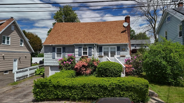 30 Florence Ave, Milford, CT 06460 - new england style home featuring roof with shingles and a chimney