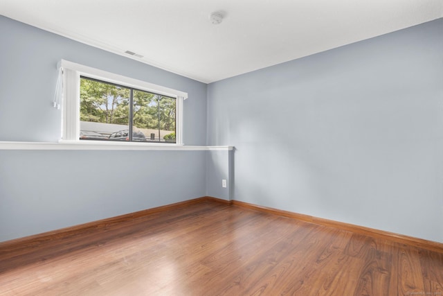 500 Darling St Unit 12M, Southington, CT 06489 - unfurnished room featuring wood finished floors, baseboards, and a smoke detector