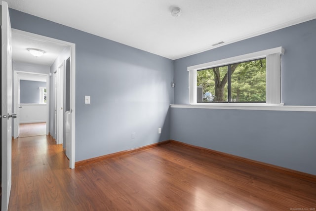 500 Darling St Unit 12M, Southington, CT 06489 - empty room featuring wood finished floors, baseboards, and a smoke detector