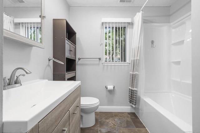 500 Darling St Unit 12M, Southington, CT 06489 - bathroom featuring baseboards, toilet, vanity, shower / tub combo, and stone finish floors