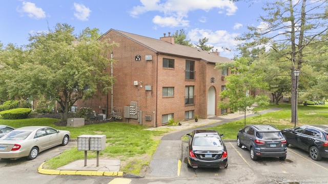 500 Darling St Unit 12M, Southington, CT 06489 - view of building exterior featuring uncovered parking