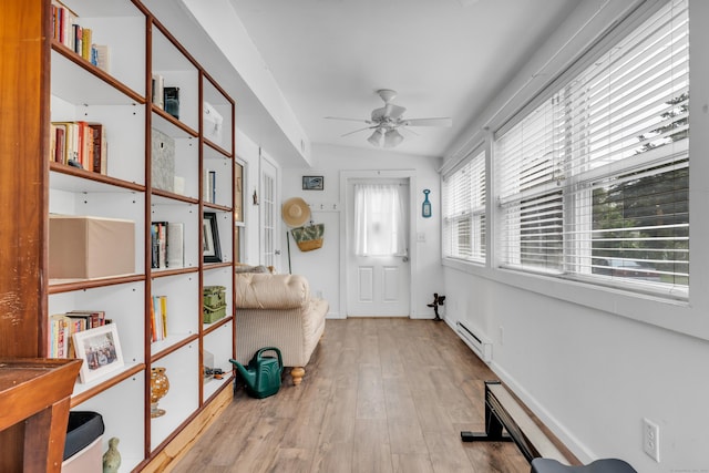 13 Green Acres Park Dr, Westbrook, CT 06498 - unfurnished sunroom featuring baseboard heating