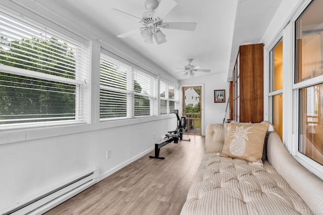 13 Green Acres Park Dr, Westbrook, CT 06498 - sunroom / solarium with baseboard heating, ceiling fan, lofted ceiling, and wood finished floors