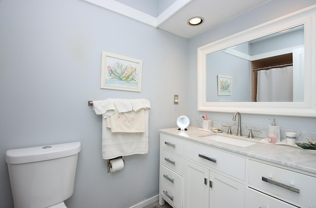 278 Heritage Vlg Unit B, Southbury, CT 06488 - bathroom featuring vanity, toilet, and recessed lighting