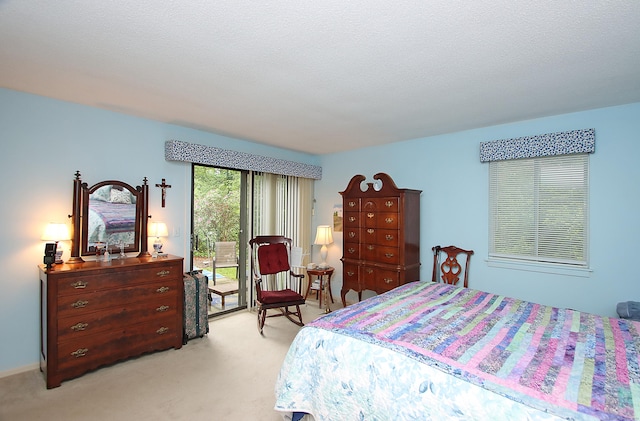 278 Heritage Vlg Unit B, Southbury, CT 06488 - bedroom with access to exterior and light colored carpet