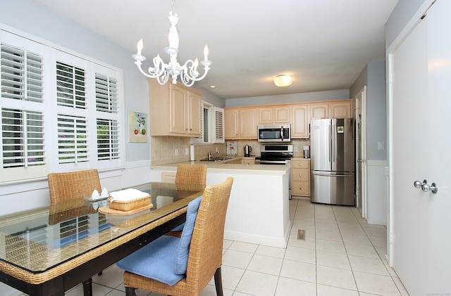 278 Heritage Vlg Unit B, Southbury, CT 06488 - kitchen featuring stainless steel appliances, a sink, light brown cabinets, and light tile patterned flooring