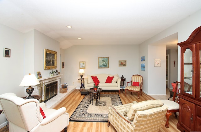 278 Heritage Vlg Unit B, Southbury, CT 06488 - living area featuring light wood-type flooring, a glass covered fireplace, recessed lighting, and baseboards