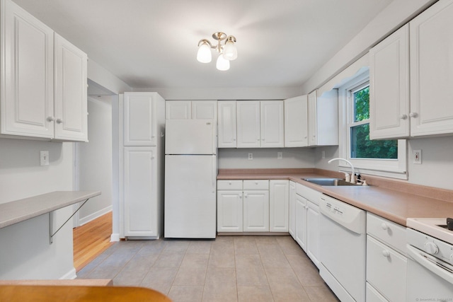 43 Worthington Rd, Glastonbury, CT 06033 - kitchen featuring white appliances, a sink, white cabinets, light countertops, and light tile patterned floors