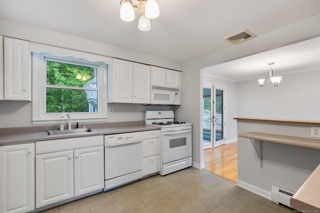 43 Worthington Rd, Glastonbury, CT 06033 - kitchen featuring white appliances, a sink, baseboard heating, a chandelier, and healthy amount of natural light
