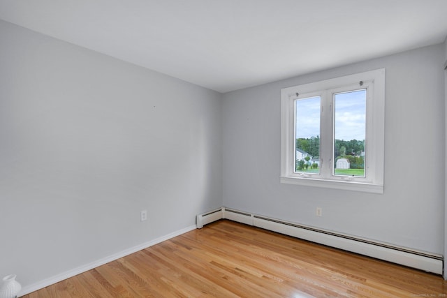 43 Worthington Rd, Glastonbury, CT 06033 - spare room with a baseboard radiator, light wood-type flooring, and baseboards