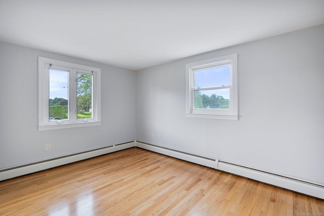 43 Worthington Rd, Glastonbury, CT 06033 - unfurnished room with wood finished floors and a baseboard heating unit