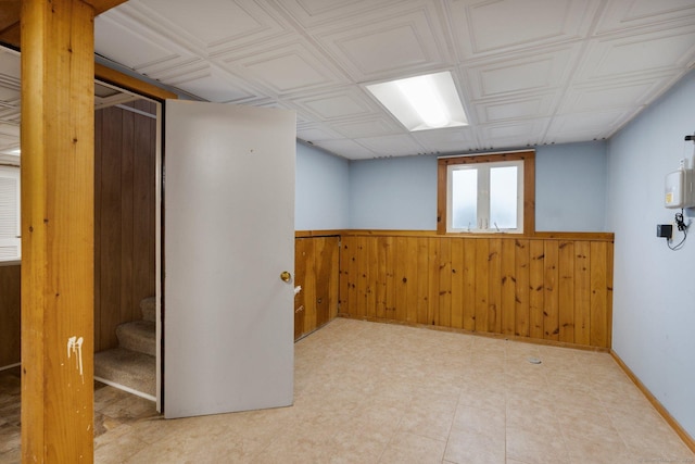43 Worthington Rd, Glastonbury, CT 06033 - below grade area with wainscoting, wood walls, and stairs