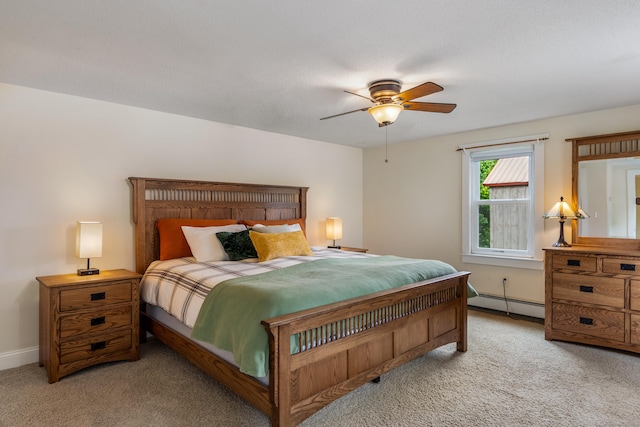 113 E Rd, East Windsor, CT 06016 - bedroom with light colored carpet, a baseboard heating unit, baseboards, and a ceiling fan
