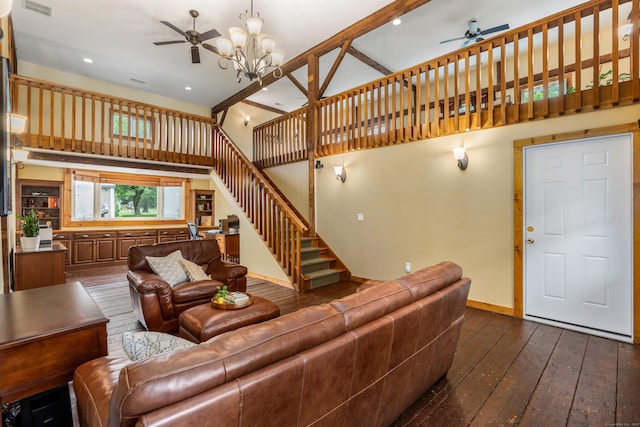 113 E Rd, East Windsor, CT 06016 - living area with ceiling fan, a towering ceiling, dark wood-type flooring, stairs, and a chandelier