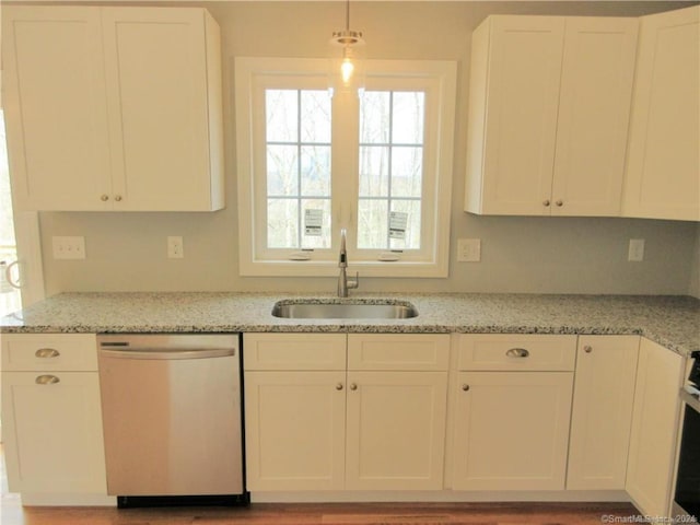 148 Gallup Hill Rd, Ledyard, CT 06339 - kitchen with stainless steel dishwasher, a sink, white cabinets, and light stone countertops