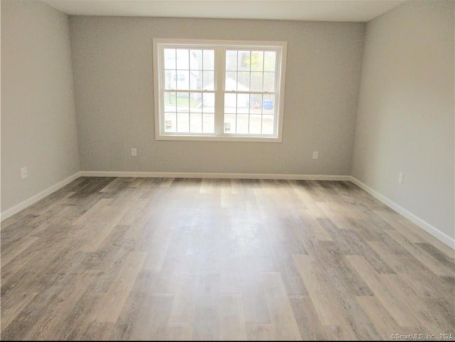 148 Gallup Hill Rd, Ledyard, CT 06339 - unfurnished room with wood finished floors and baseboards