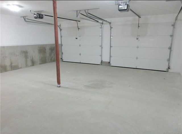 148 Gallup Hill Rd, Ledyard, CT 06339 - garage featuring a garage door opener