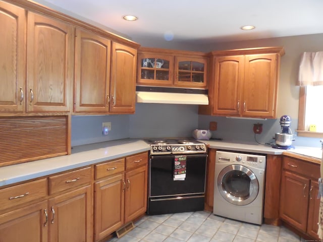 85 Blackberry Hill Rd, Beacon Falls, CT 06403 - kitchen featuring washer / clothes dryer, electric range, under cabinet range hood, light countertops, and light tile patterned flooring